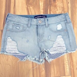 Women’s Light Blue Distressed Jean Shorts with Frayed Hem